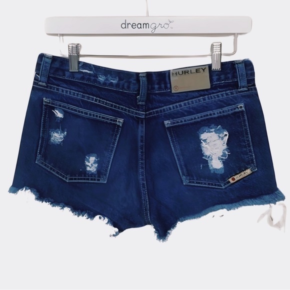 Shop the Trend: Women's Junior Size 7 Dark Denim Ripped & Frayed Hurley Shorts - Picture 2 of 3